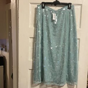 New. Old Navy gorgeous lined , plastic pallets pull on skirt Sz L. Waist 30”-32”